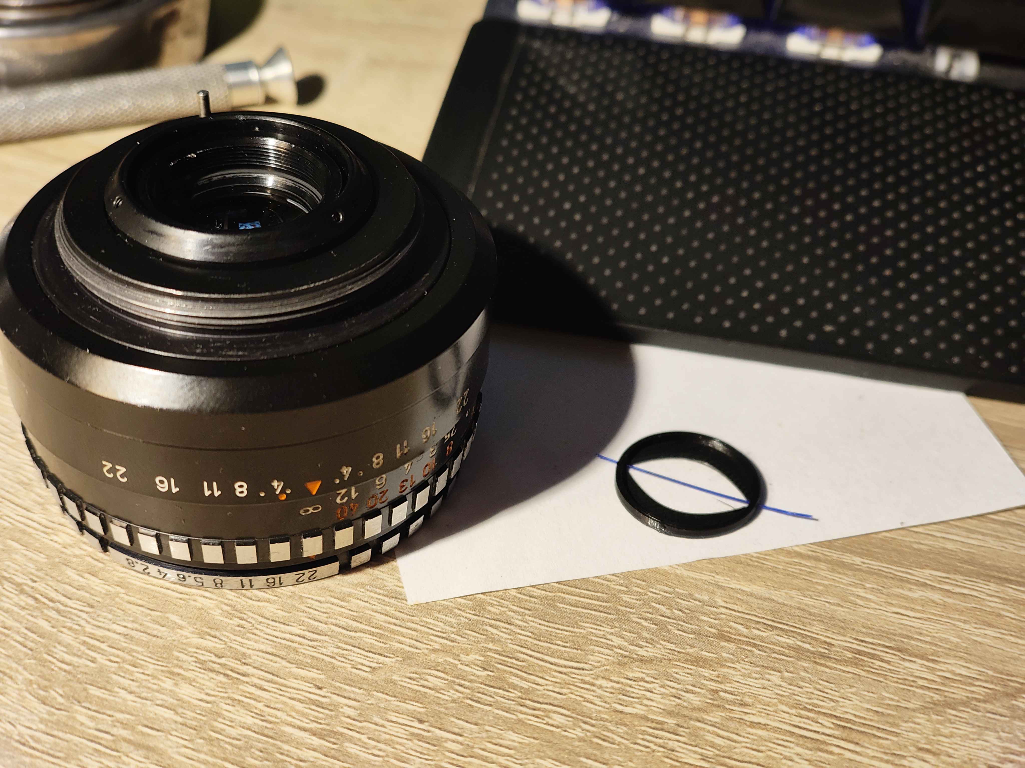 an image of a lens and a mod part