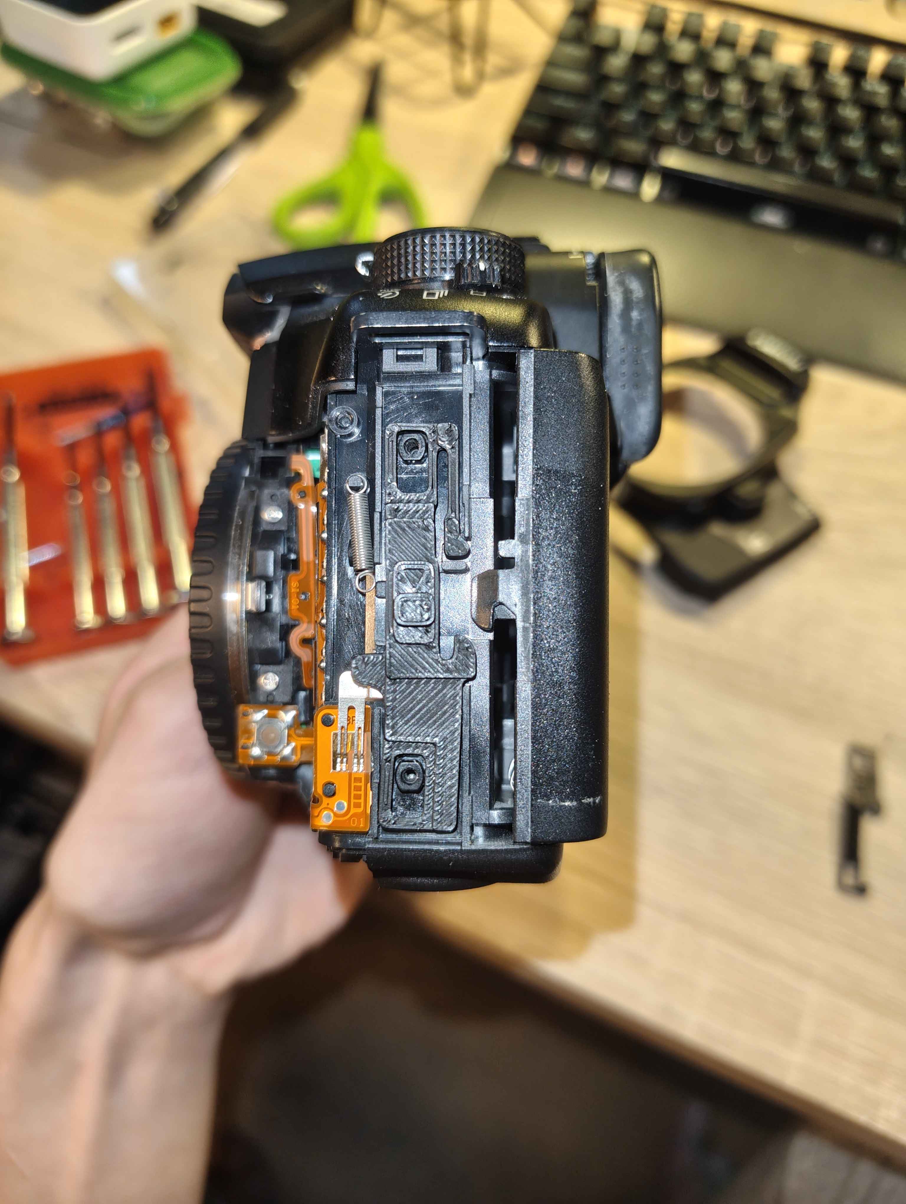 an image of a camera with the new part.