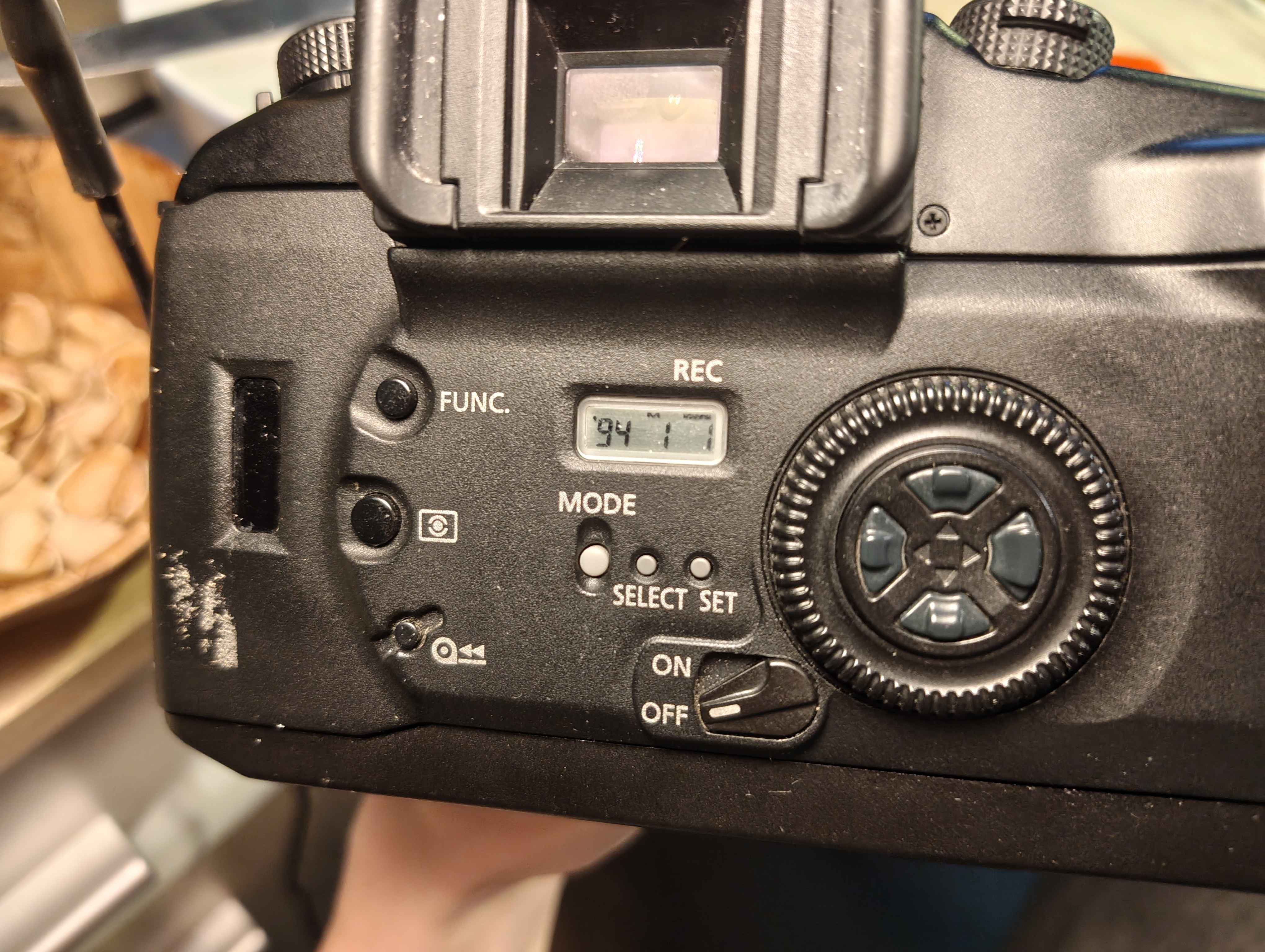 an image of a back of the camera with the year 1994 visible.